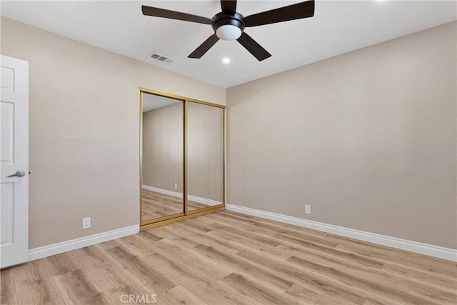 12899 Rain Shadow Rd, Victorville, CA 92395 - unfurnished bedroom with visible vents, baseboards, a closet, and light wood finished floors