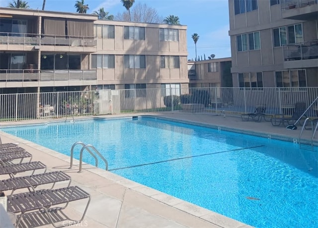 community pool with fence