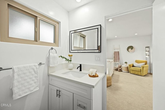 bathroom with vanity and recessed lighting