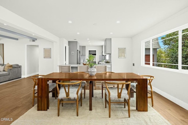 dining area with recessed lighting, visible vents, baseboards, and light wood-style flooring