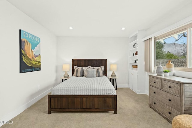 bedroom featuring light carpet, recessed lighting, and baseboards