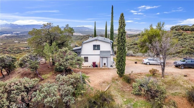 exterior space featuring a mountain view