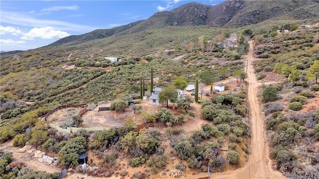 drone / aerial view featuring a mountain view