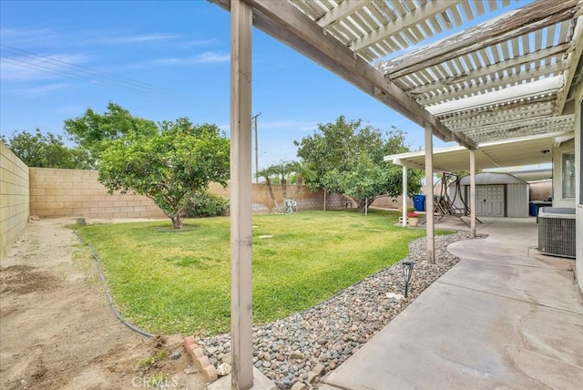 view of yard with a fenced backyard, a pergola, central AC, an outdoor structure, and a storage shed