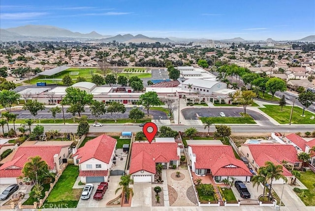 bird's eye view featuring a mountain view and a residential view