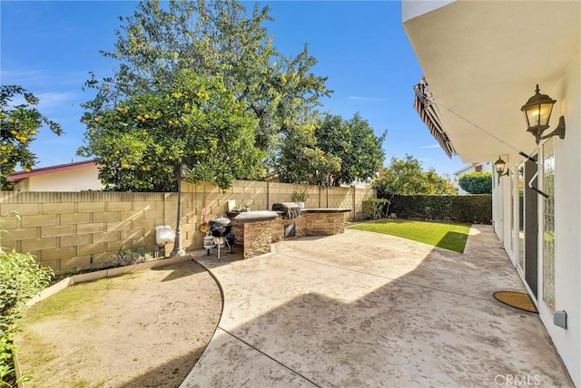 view of patio featuring a fenced backyard