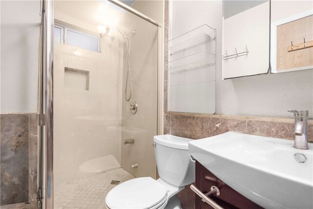 1316 Edgewood Dr, Alhambra, CA 91803 - bathroom featuring tile walls, vanity, toilet, and a shower stall
