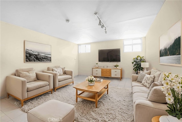 1316 Edgewood Dr, Alhambra, CA 91803 - living area with light tile patterned floors, rail lighting, and a healthy amount of sunlight