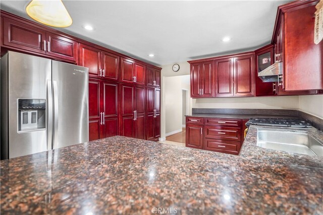 1316 Edgewood Dr, Alhambra, CA 91803 - kitchen with reddish brown cabinets, a sink, stainless steel fridge, exhaust hood, and recessed lighting