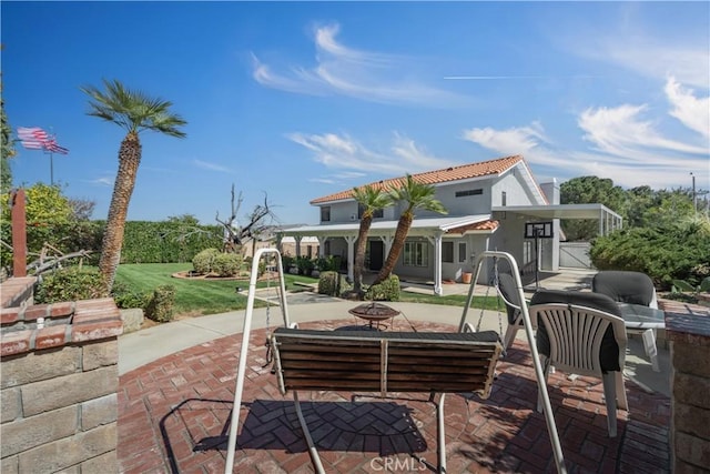 view of patio / terrace featuring a fire pit