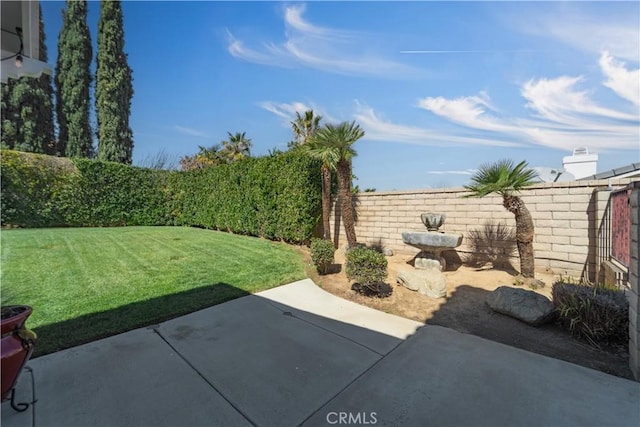 view of patio with a fenced backyard