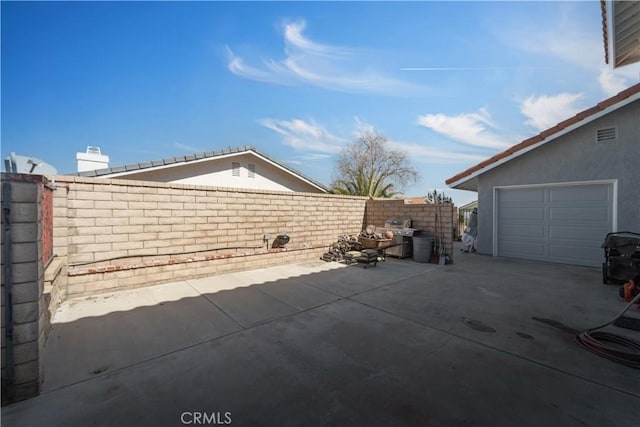 view of patio / terrace featuring a fenced backyard