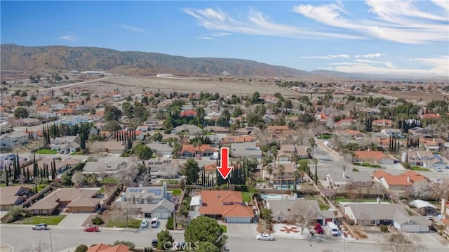 bird's eye view with a mountain view and a residential view