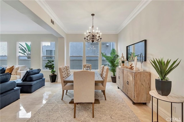 dining space with a chandelier, visible vents, crown molding, and baseboards