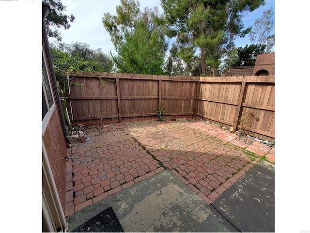 view of patio featuring a fenced backyard