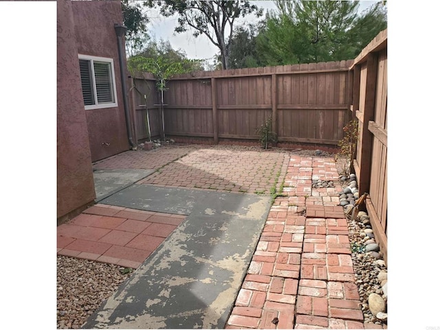 view of patio / terrace with a fenced backyard