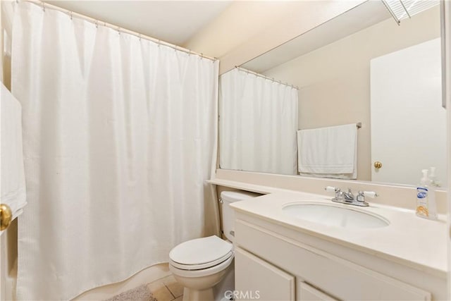 full bath with tile patterned flooring, toilet, and vanity