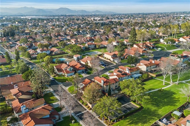 birds eye view of property featuring a residential view and a mountain view