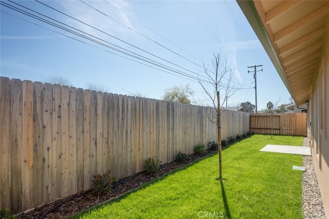 view of yard featuring a fenced backyard