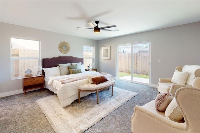 carpeted bedroom with access to exterior, visible vents, ceiling fan, and baseboards