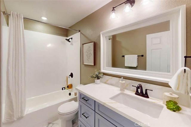 full bath featuring vanity, shower / bath combination with curtain, toilet, and a textured wall