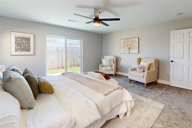 carpeted bedroom featuring a ceiling fan, access to exterior, baseboards, and visible vents