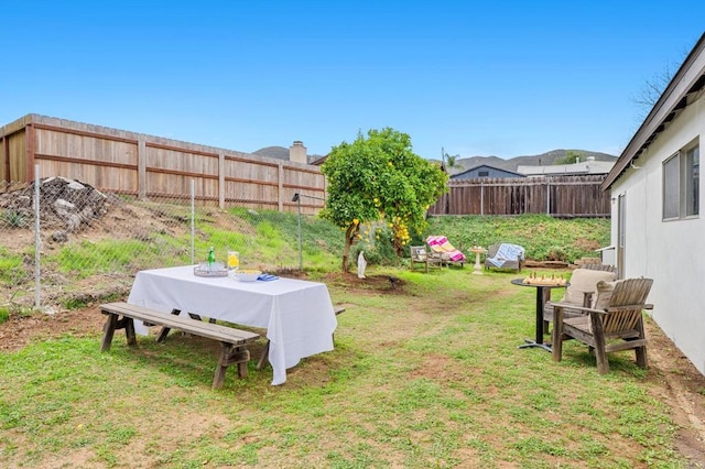 view of yard with a fenced backyard