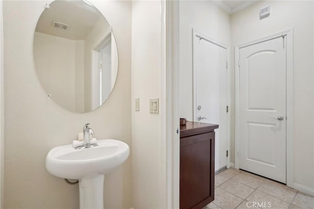 bathroom with tile patterned floors and visible vents