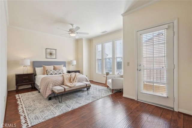 bedroom with visible vents, wood-type flooring, baseboards, and access to exterior