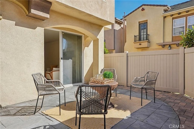 view of patio / terrace with fence