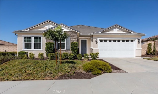 ranch-style house featuring stucco siding, a garage, concrete driveway, and a tile roof