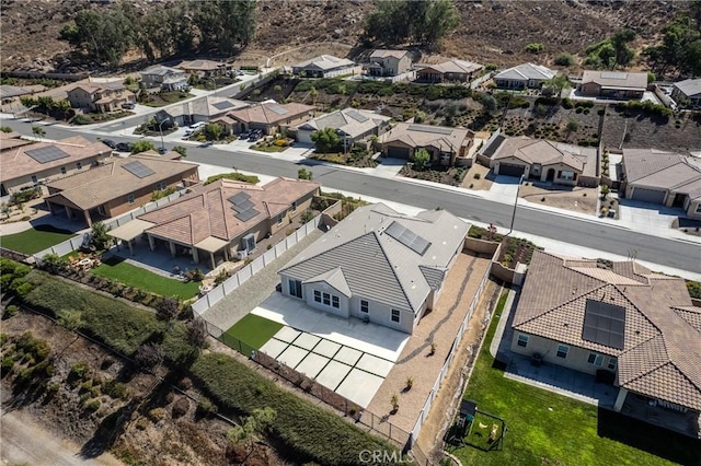 birds eye view of property with a residential view