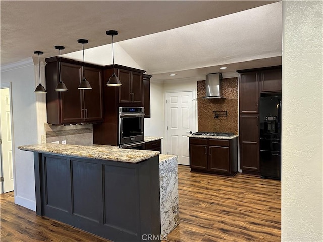 kitchen featuring dark wood-style floors, appliances with stainless steel finishes, wall chimney exhaust hood, and decorative backsplash
