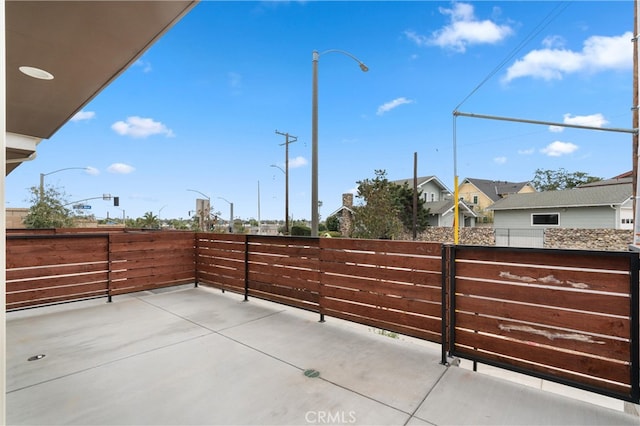 view of patio featuring fence