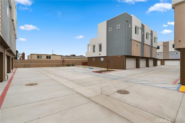 view of patio / terrace featuring fence