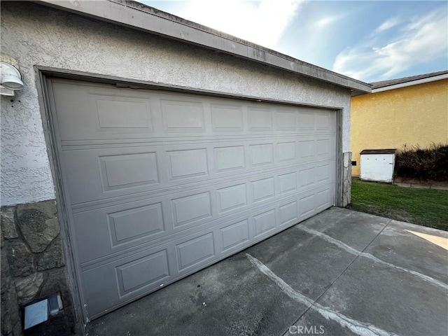 garage with driveway