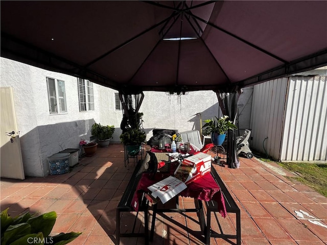 view of patio featuring a gazebo