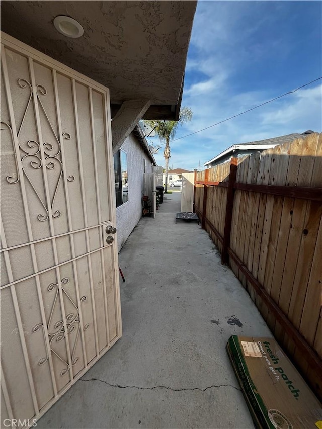 view of property exterior featuring fence