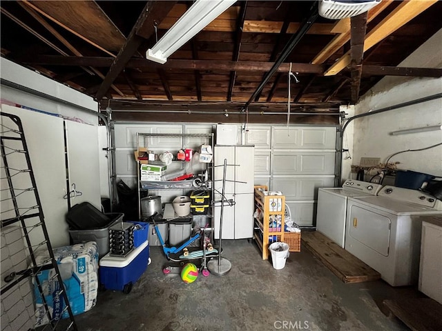 garage with washing machine and dryer