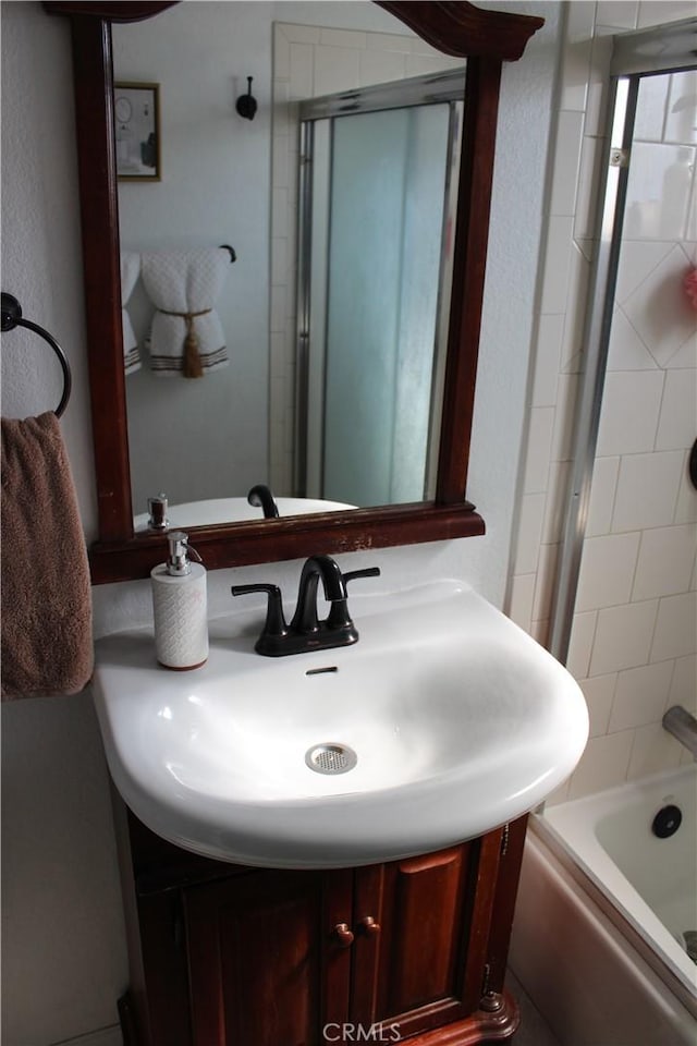 full bath featuring shower / washtub combination and vanity