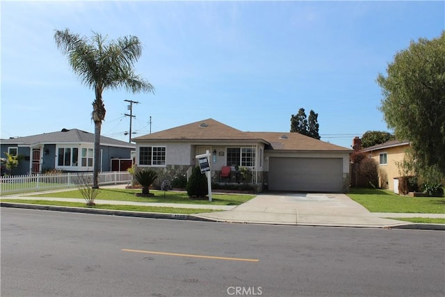 ranch-style house with a front yard, fence, stucco siding, concrete driveway, and a garage