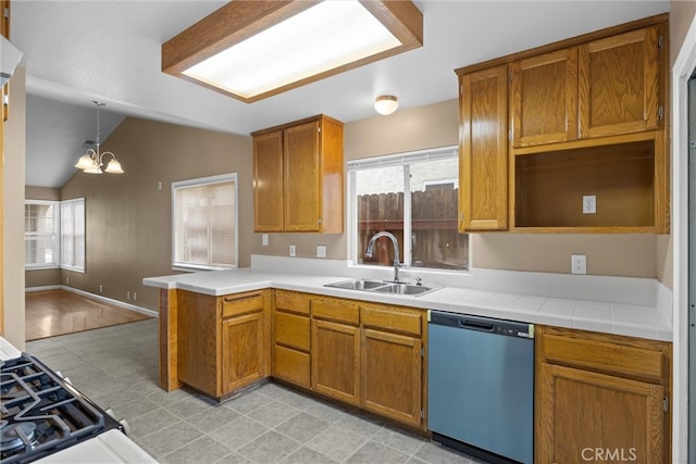 kitchen with dishwasher, lofted ceiling, brown cabinets, a peninsula, and a sink