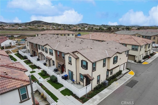 aerial view featuring a residential view and a mountain view