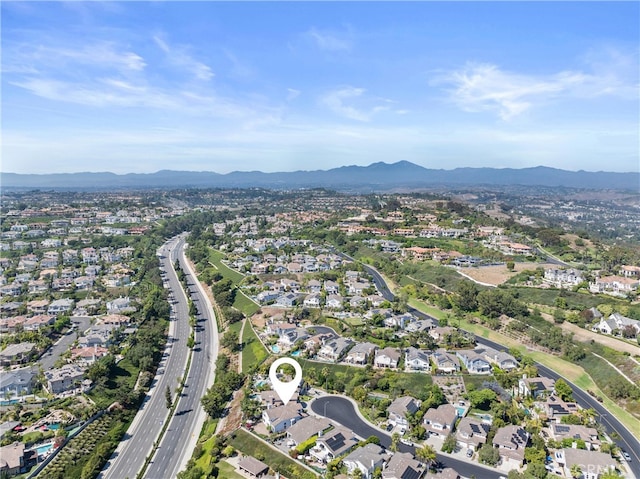 bird's eye view with a residential view and a mountain view