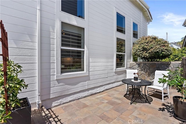 view of patio with fence