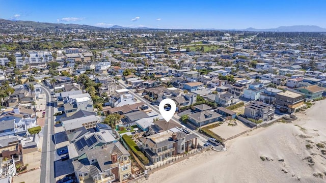 bird's eye view featuring a mountain view and a residential view