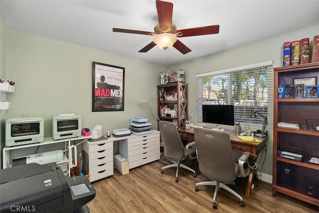 office with ceiling fan and wood finished floors