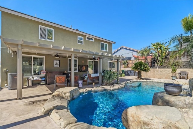 view of pool with an outdoor living space, a fenced in pool, fence, central AC unit, and a patio area