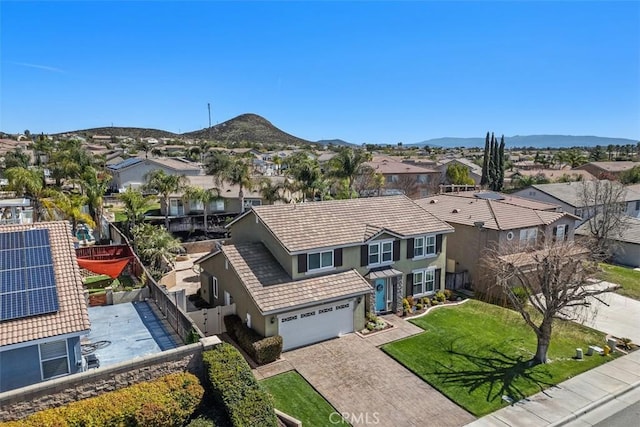 bird's eye view featuring a mountain view and a residential view