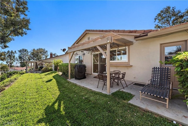 view of yard featuring a pergola and a patio